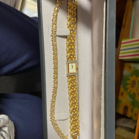 Woman’s Citizen gold watch with diamonds